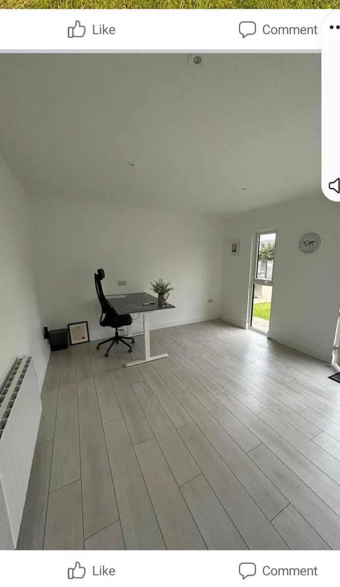 Garden office interior with standing desk