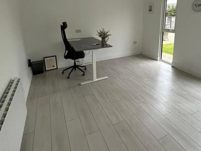 Photograph of the empty interior of the finished garden office